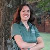 Abigail in a green mason polo smiling
